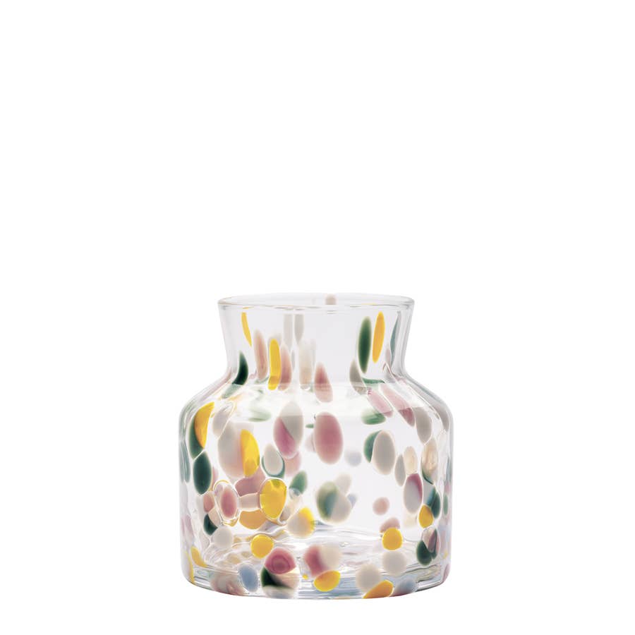 Glass vase with a wide base featuring a pattern of small, multicolored translucent spots.