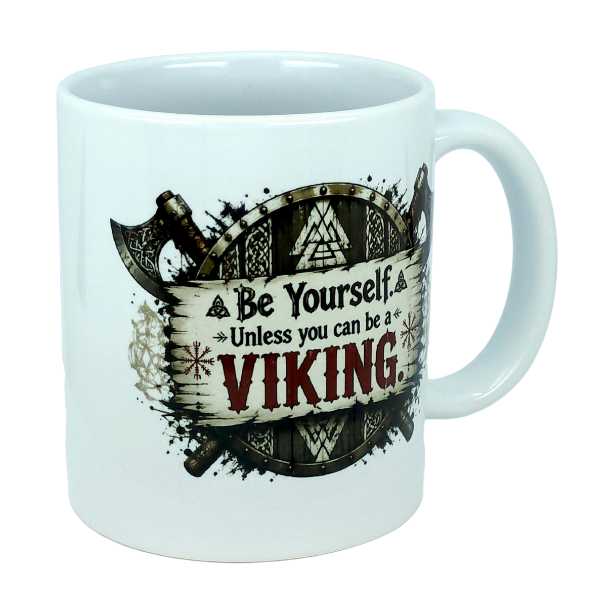 Introducing the Mug: Be Yourself Unless You Can Be A Viking Ceramic Mug (11 oz Capacity) from Nordic Wholesale. This white ceramic mug features a striking Viking axe and shield graphic, with the phrase "Be Yourself. Unless you can be a VIKING" printed on it—the word "VIKING" boldly highlighted in large red letters. It's the perfect gift for Norse mythology enthusiasts or anyone who appreciates bold Nordic warrior-inspired designs.