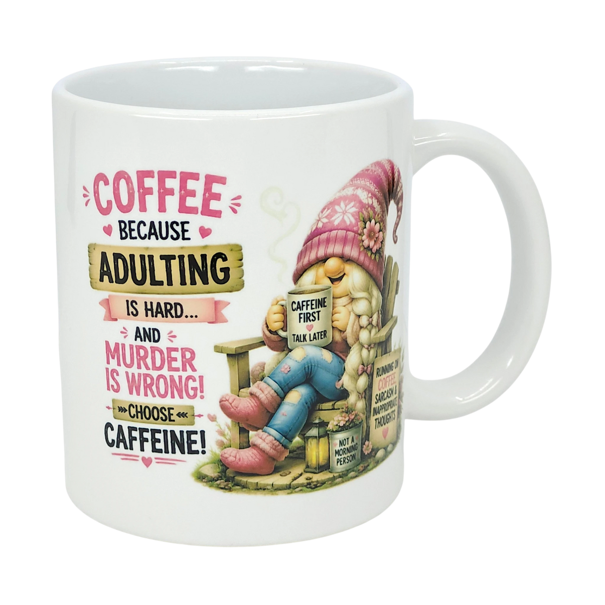 The Nordic Wholesale Mug: Choose Caffeine Tomte Ceramic Mug (11 oz) features a Nordic gnome in a pink hat holding coffee and the phrase: Coffee because adulting is hard... and murder is wrong! Plus, other funny coffee quotes.