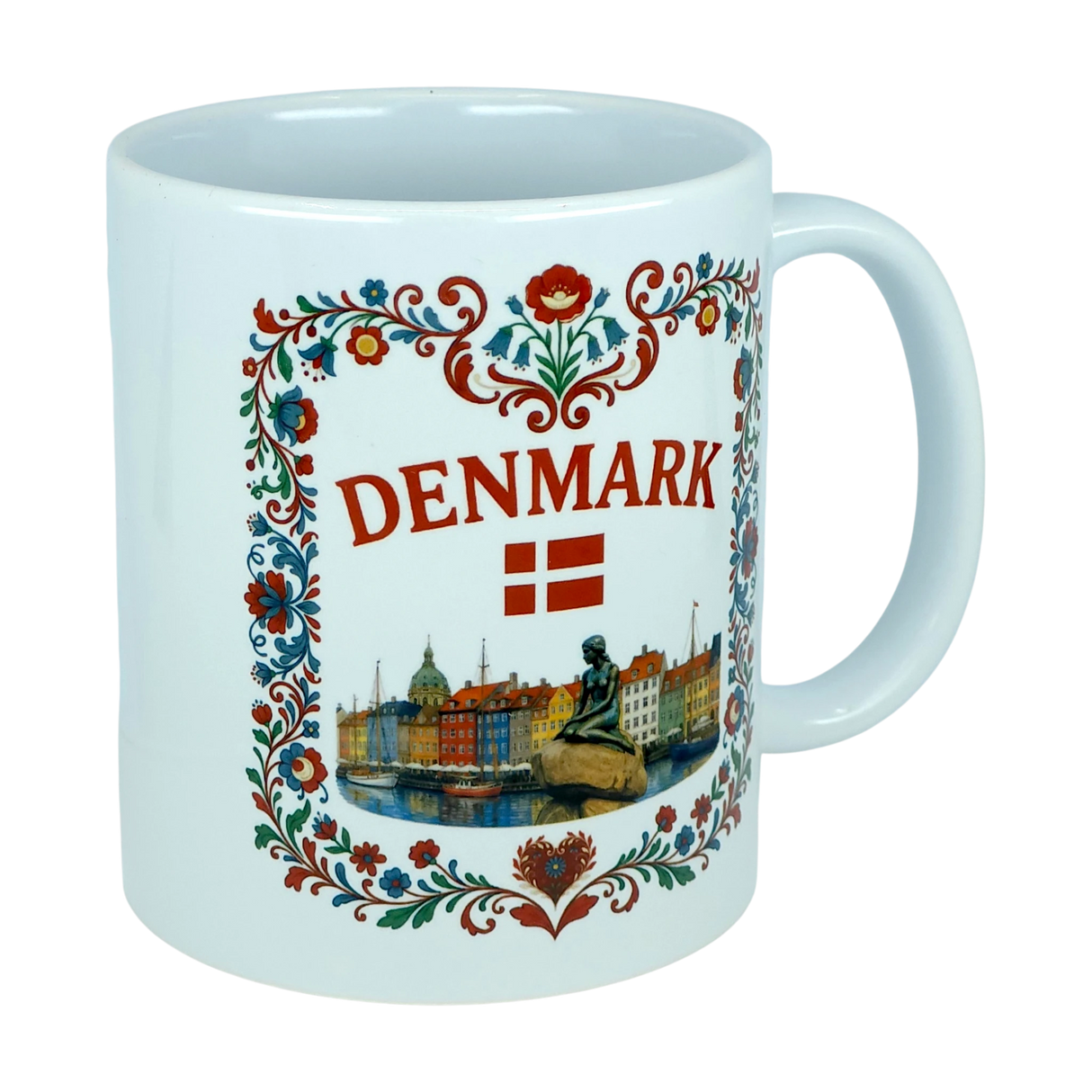 The Mug: Denmark Nyhavn Ceramic Mug (11 oz Capacity) by Nordic Wholesale is a white ceramic mug featuring colorful floral designs, the word "DENMARK," the Danish flag, and delightful illustrations of famous Danish landmarks such as Nyhavn harbor and the iconic Little Mermaid statue.
