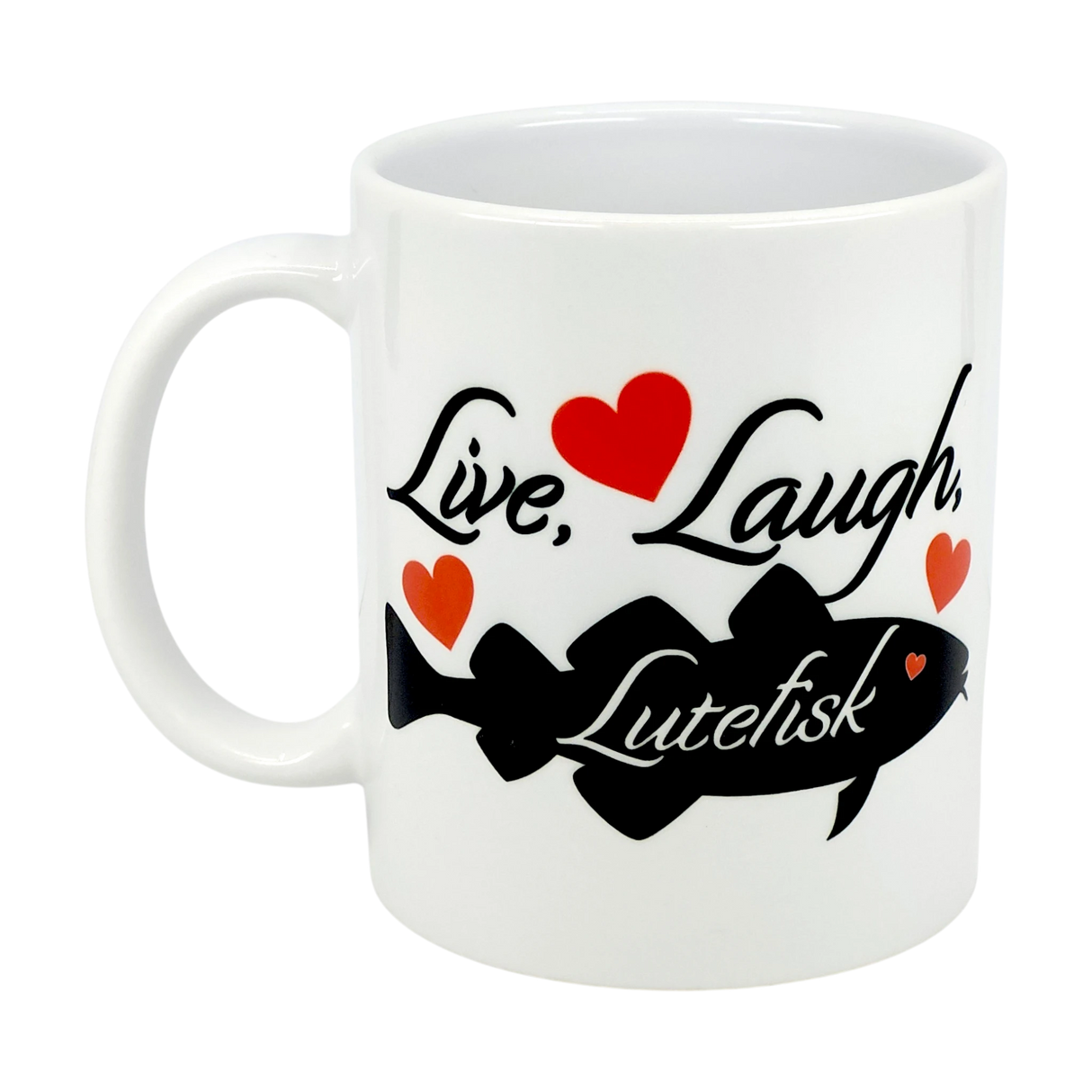 The Nordic Wholesale 11oz ceramic mug features “Live, Laugh, Lutefisk” in black text, a black fish graphic, and red hearts—a fun Scandinavian humor gift for fans of quirky traditions.