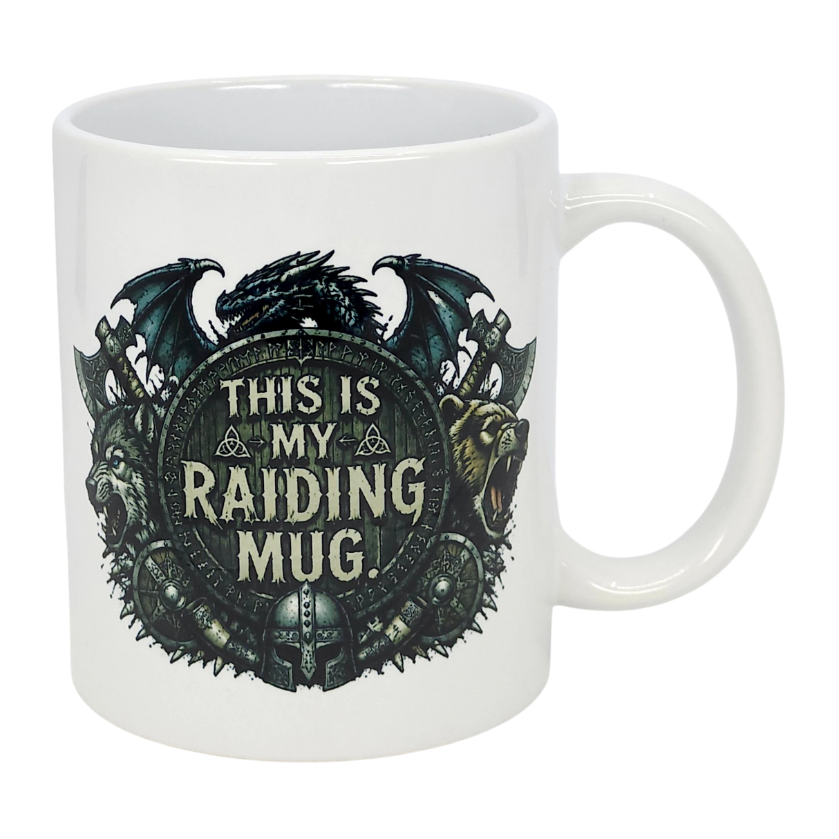 The Nordic Wholesale Mug: This Is My Raiding Mug Viking Ceramic Mug (11 oz) is a white ceramic mug with a dragon, wolf, and bear around a shield reading "This Is My Raiding Mug," surrounded by Norse and Viking-style designs.