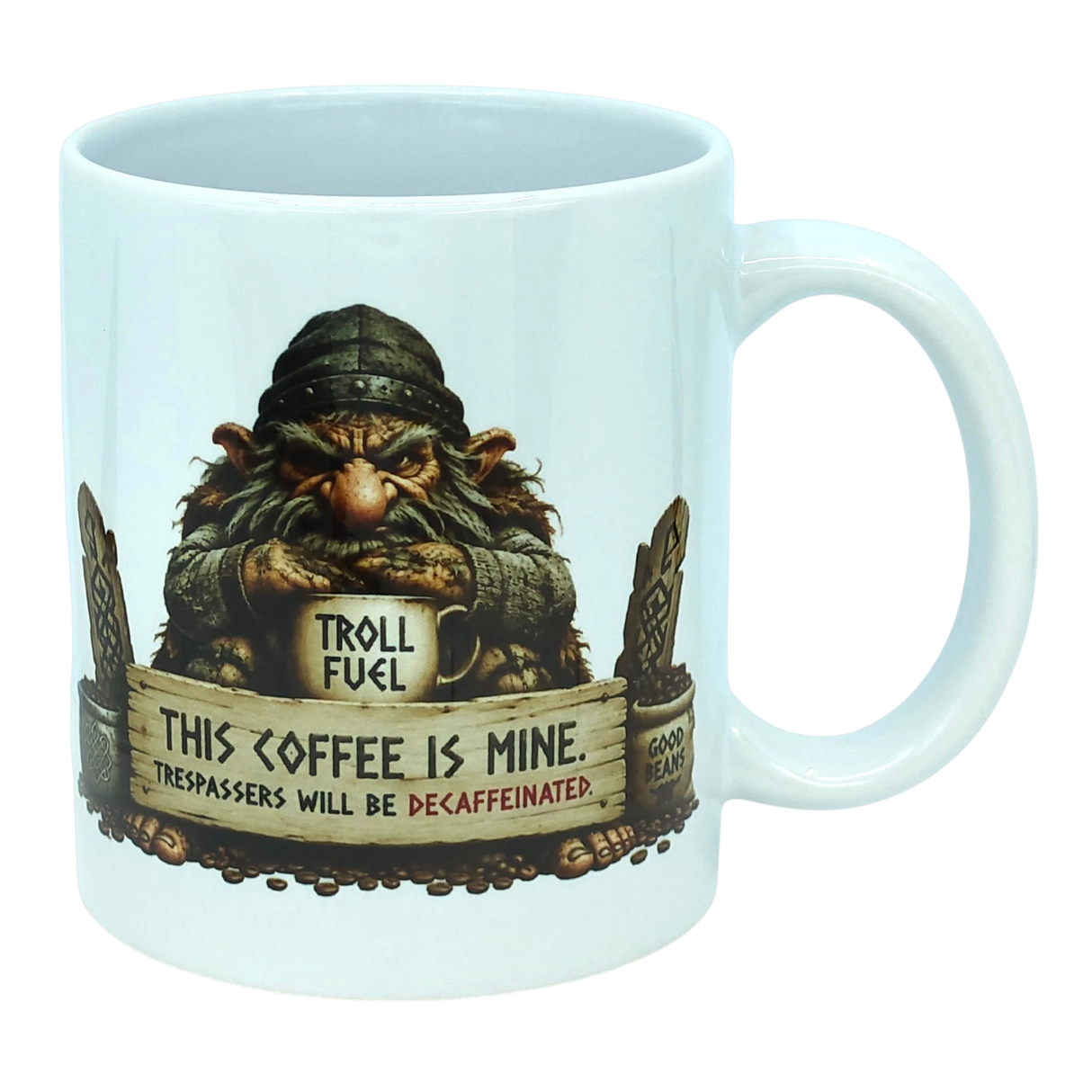 The Mug: Troll Fuel Ceramic Coffee Mug (11 oz Capacity) by Nordic Wholesale is a white ceramic mug featuring a grumpy troll inspired by Nordic folklore, holding a cup labeled "Troll Fuel" with the warning: "This coffee is mine. Trespassers will be decaffeinated." Decorative accents and coffee beans surround the troll, making this Scandinavian-themed mug both whimsical and bold.