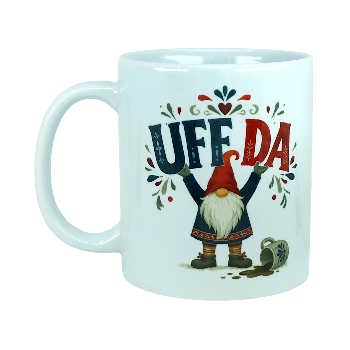 White mug featuring a Nordic tomte illustration with the text UFF DA above a spilled mug.