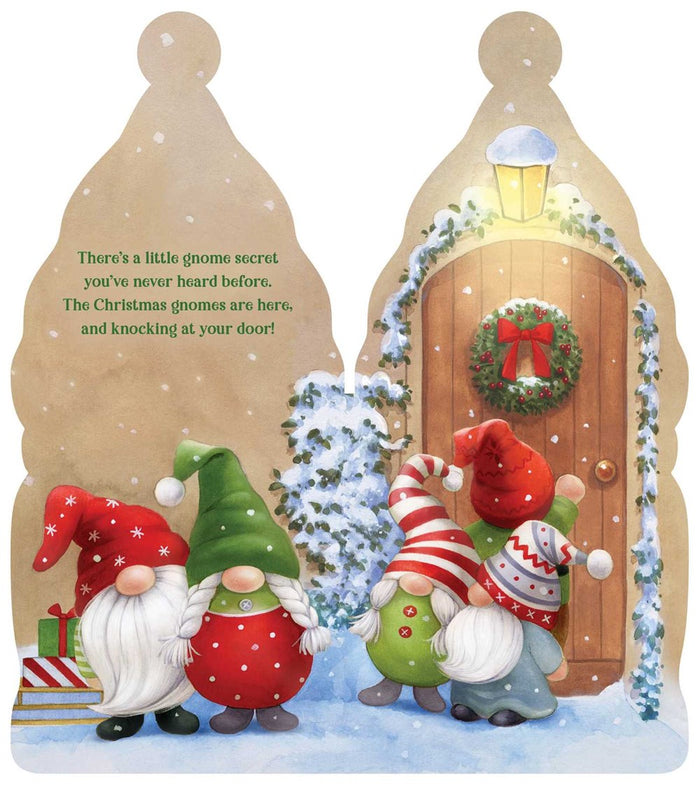 The book "Christmas Gnomes" by Kelly Green features gnome characters in festive hats, a snow-covered doorstep, and a wooden door, all on a gnome-shaped board book with a fuzzy beard cover.