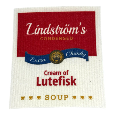 A playful Swedish Gift Store dishcloth features a faux Lindstrom’s Cream of Lutefisk Soup label in classic red, white, and blue with gold accents, mimicking vintage soup can designs—bringing Scandinavian kitchen humor to your cleaning routine.