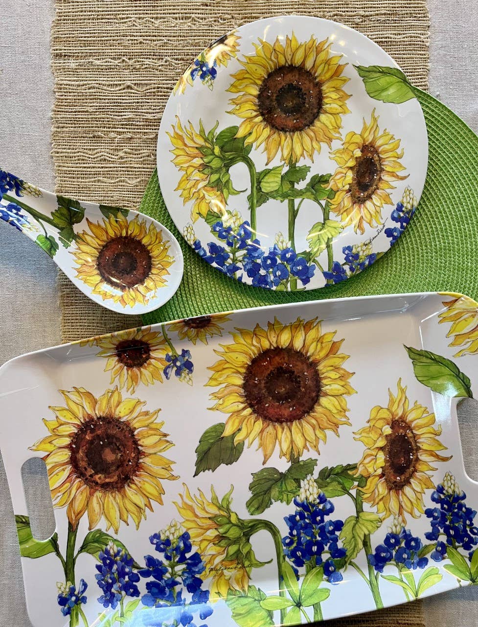 The Spoon Rest: Sunflower & Bluebonnets Floral Flowers Bamboo Spoon Rest, paired with a plate and spoon on a green placemat and beige woven runner, creates the perfect floral kitchen accessory.
