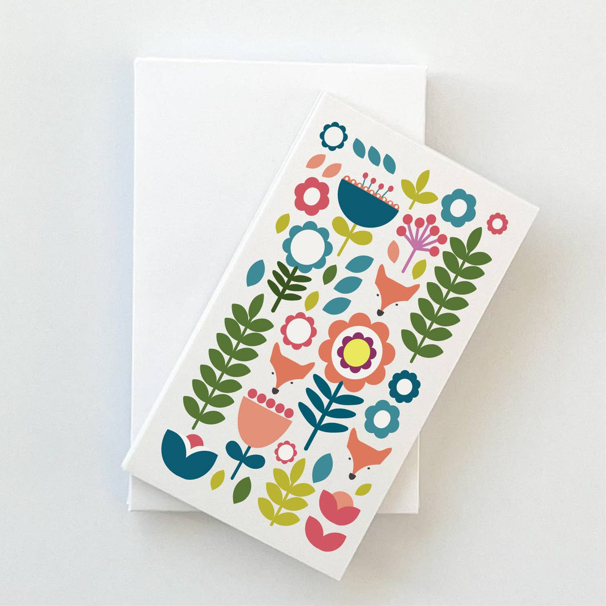 The Juniper Blue "Tuli" Gift Card set includes 8 Scandinavian folk-art gift tags featuring fox and colorful floral designs, each sized 2"x3.5", with envelopes, perfect for any occasion.