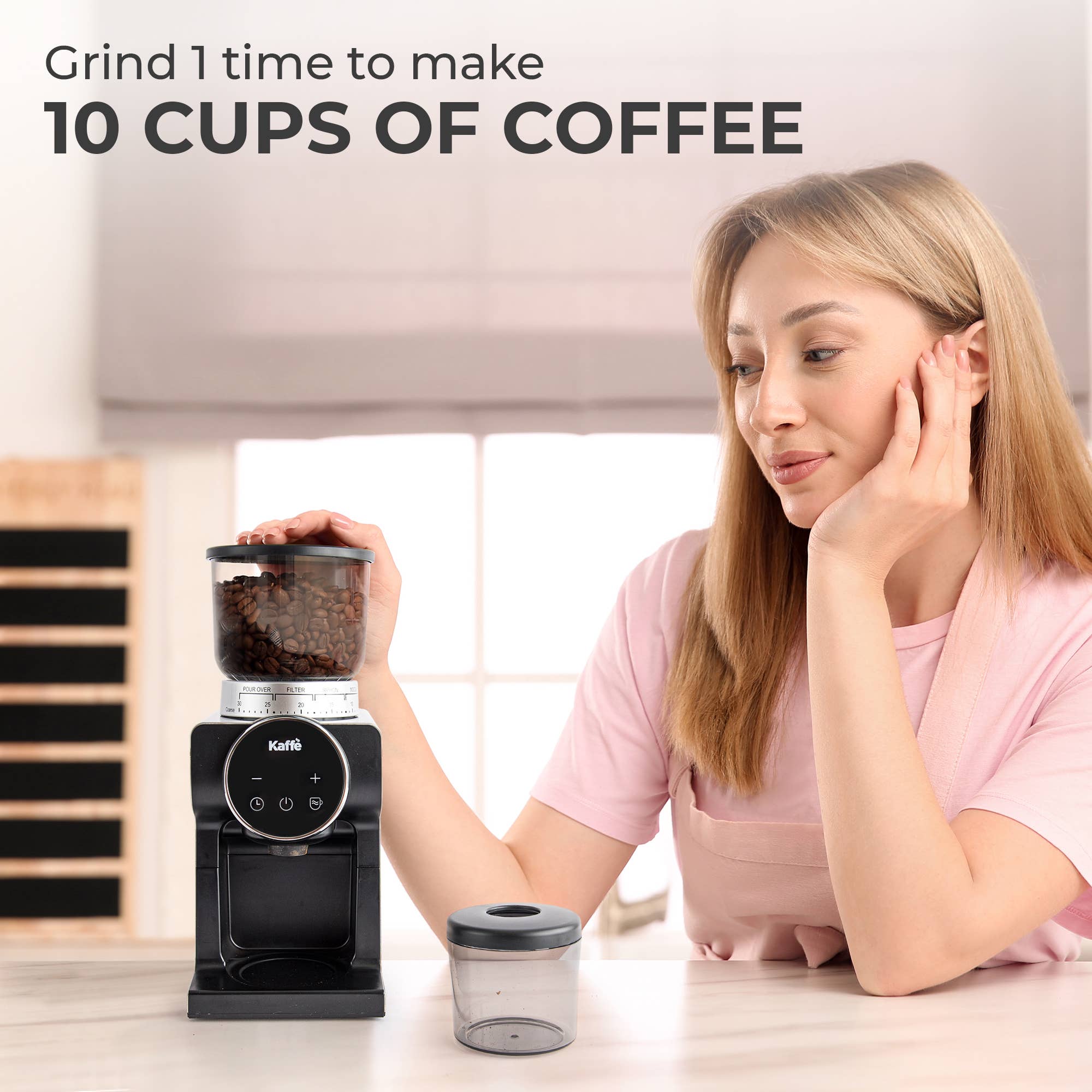 A woman sits at a table with her hand on the Coffee Grinder: Electric Conical Burr Coffee Grinder – Precision Grinding with Digital Control, filled with coffee beans, under text that reads, Grind once to make 10 cups of coffee.
