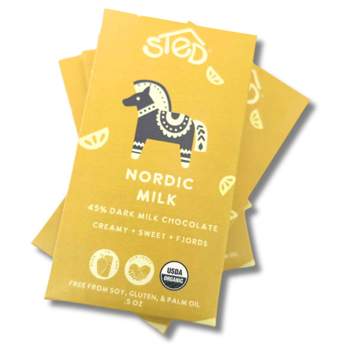 Three yellow Nordic Milk chocolate wrappers with a stylized horse and USDA Organic logo arranged on a white background.