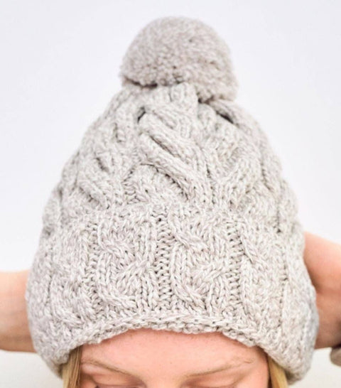 Hat: Clifden Cable Aran Hat with Pom Poms - Oat: One Size
