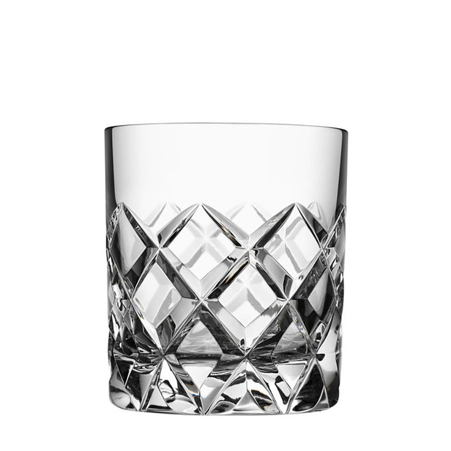 A clear, empty cut glass tumbler with a textured diamond pattern rests against a plain white background, echoing the timeless elegance of Orrefors: Sofiero Double Old Fashioned (2-Pack) by Gunnar Cyrén.