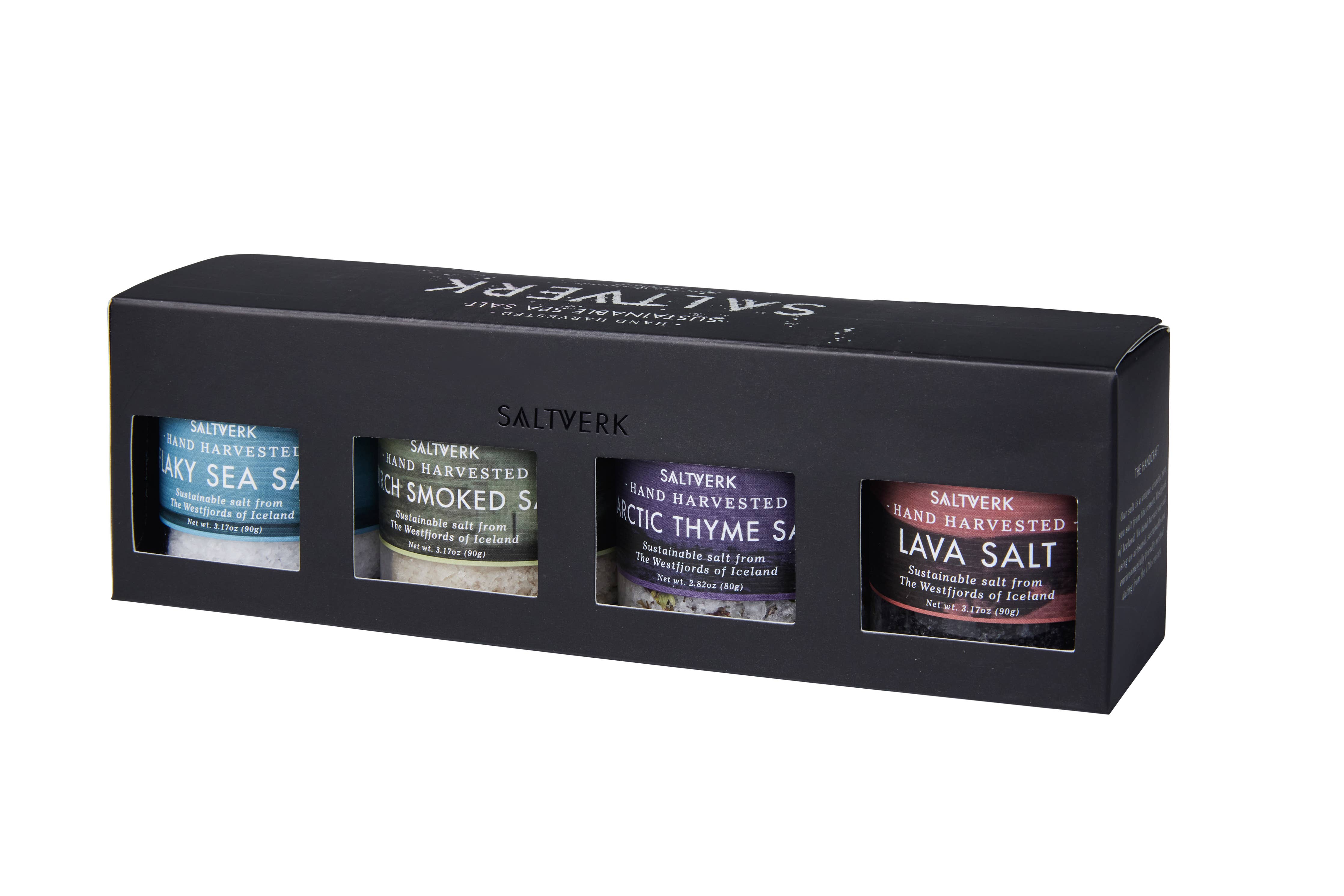 The SALTVERK Gift Set features four Icelandic sea salts: Flaky Sea Salt, Lava Salt, Birch Smoked Salt, and Arctic Thyme Salt—each in a glass jar.