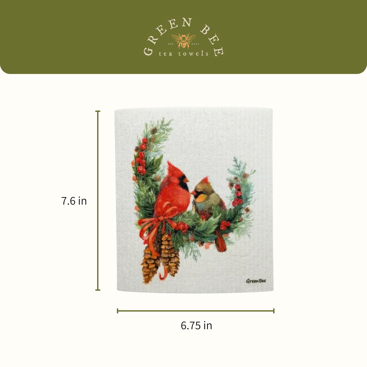 Swedish dishcloth featuring two cardinals perched on a pine branch with pinecones, holly berries, and a red bow.