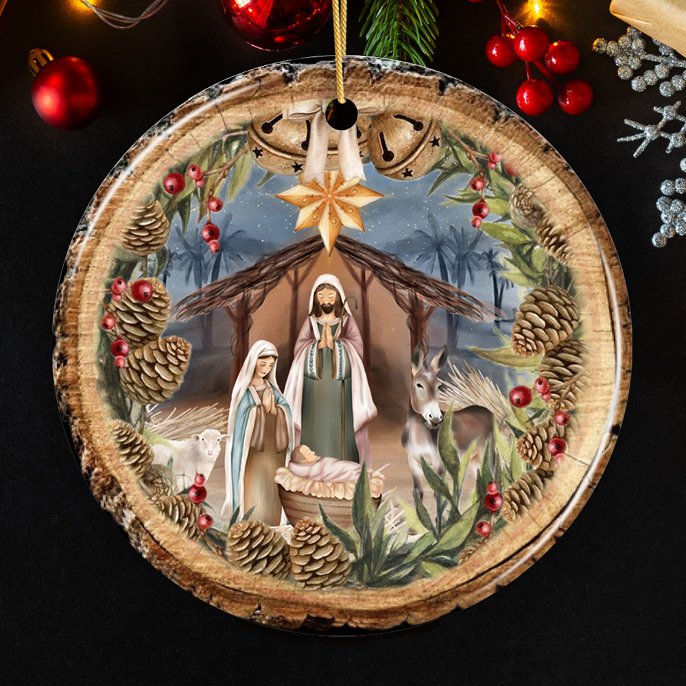 Rustic Nativity Ornament features Mary, Joseph, baby Jesus, and animals with pinecones and red berries beneath a golden star.