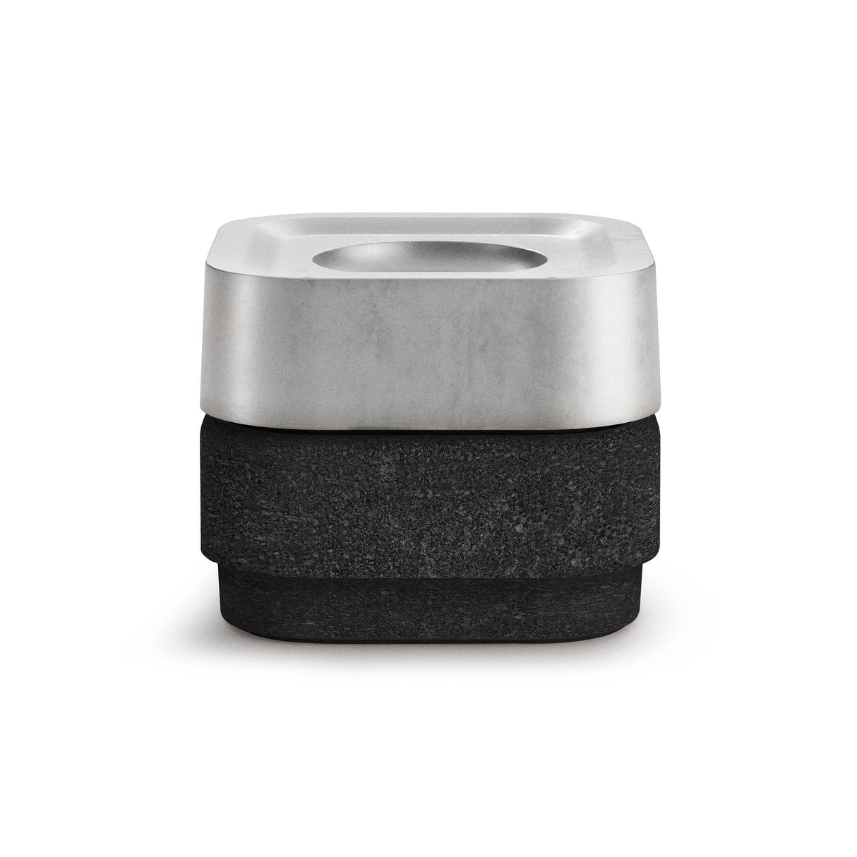 The Stumpastaken Ettan Candle Holder is a square, minimalist container made from 100% recycled material with a white powder-coated finish (8.8x8.8x4 cm), photographed against a white background to highlight its sustainable design.
