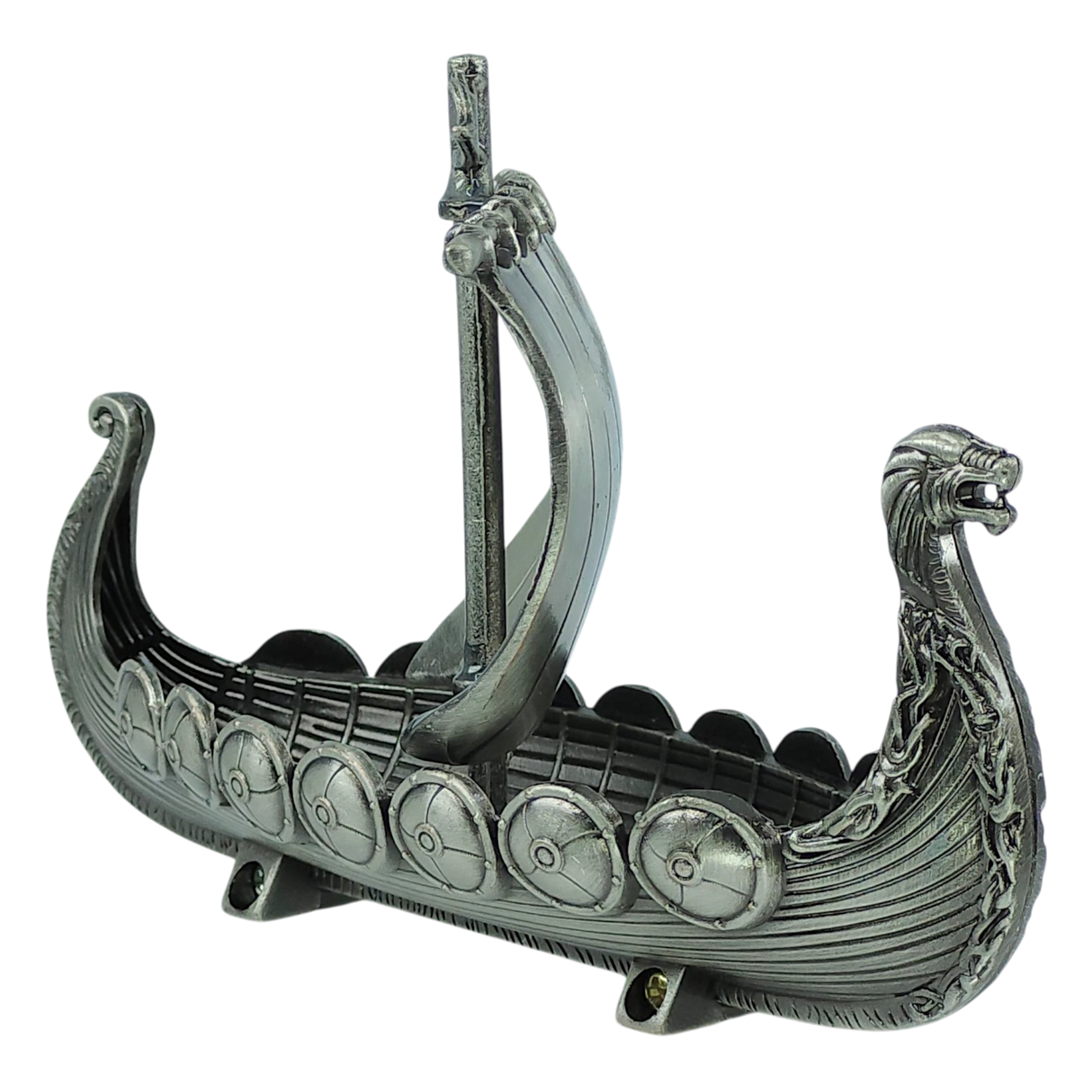 The Figurine: Norwegian Viking Ship with Sail Pewter 5″x3″ Table Decor by Faire - Scandinavian Specialties is a meticulously handcrafted metallic model featuring a dragon-shaped prow, single mast, and intricately detailed shields along the sides—a striking Norwegian keepsake perfect for collectors and history enthusiasts.
