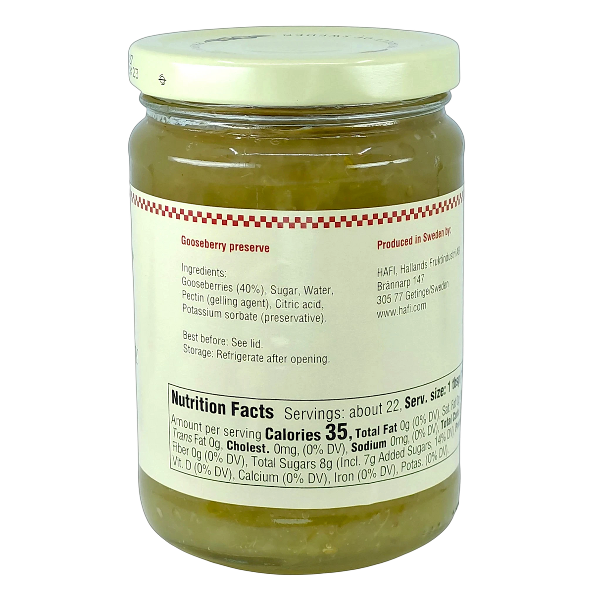 Glass jar of green, chunky gooseberry preserves with a white label displaying ingredients, nutrition facts, and storage instructions.