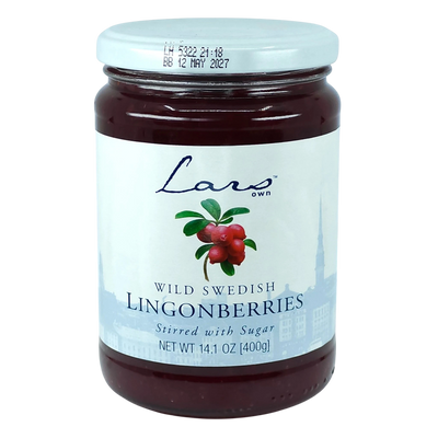 A glass jar labeled Scandinavian wild Swedish lingonberries stirred with sugar, showing red berries and stating net weight 14.1 oz (400g).