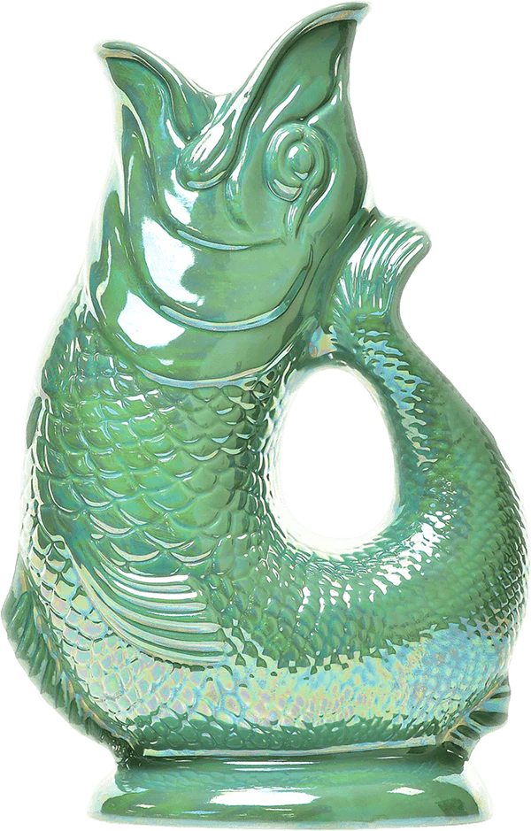 The Lustre Gluggle Jug is a green ceramic fish-shaped jug with an open mouth, textured scales, and a gracefully curved handle.