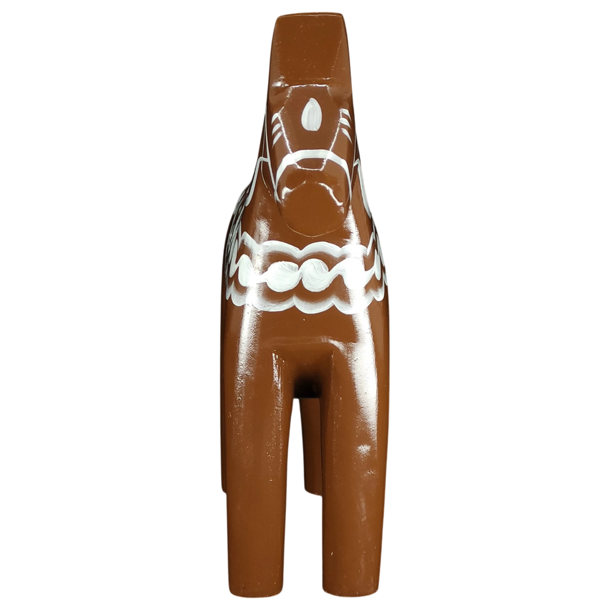 The Dala Horse: Brown Swedish Dala Horse "Gingerbread" by Grannas Olsson, handcrafted in Sweden (13 cm), features white patterns and Scandinavian design, shown from the back against a white background.