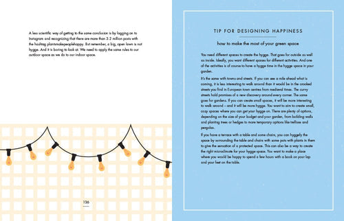 An open book titled "My Hygge Home" features an illustration of decorative string lights on the left and a blue text box labeled "Tip for Designing Happiness" on the right, capturing the cozy essence of Danish design.