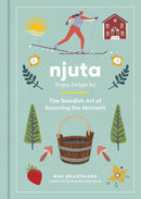 The cover of the book Njuta by Niki Brantmark beautifully depicts a skier navigating through trees, with mushrooms and a basket nearby, epitomizing the Swedish art of savoring each moment in life.