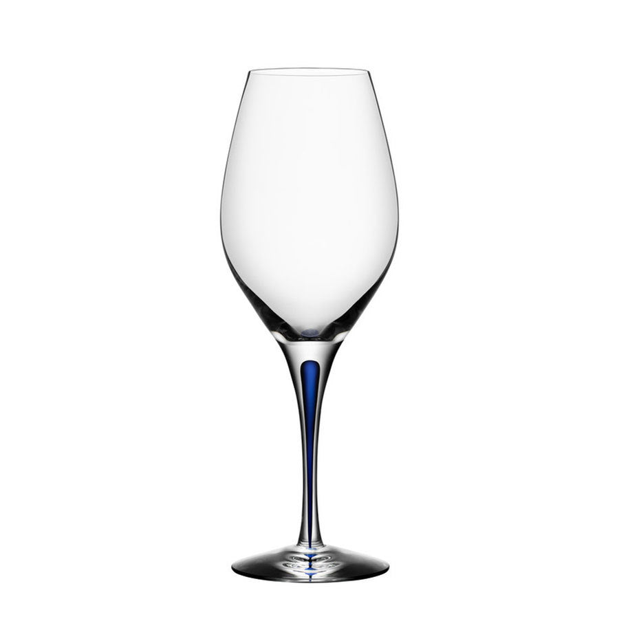 A clear Orrefors wine glass with a blue-tinted slender stem, part of the elegant Intermezzo Blue collection, called the Intermezzo Blue Wine Balance Glass 14oz.