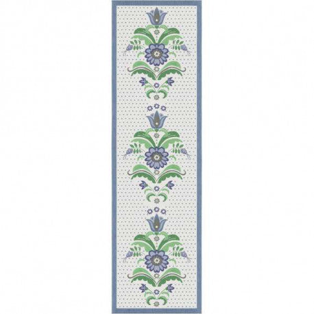 The Bla Kurbits or Blue Flowers Table Runner by Ekelund Master Weavers, made from organic cotton, showcases a rectangular pattern with vertical blue and green floral designs bordered by a thin blue line, bringing elegance to any dining setting.