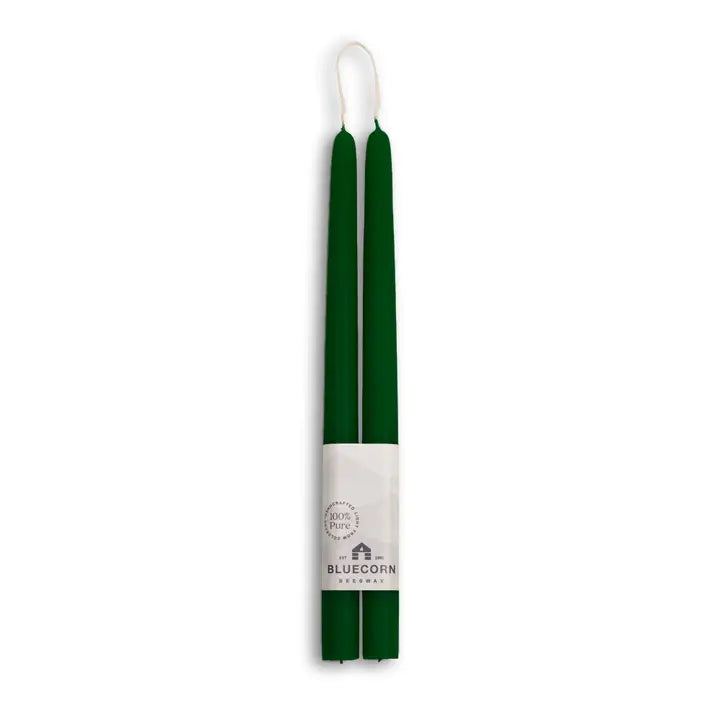 Two handmade, eco-friendly 12" beeswax taper candles are shown side by side with a Bluecorn Beeswax label—dripless and perfect for any setting.