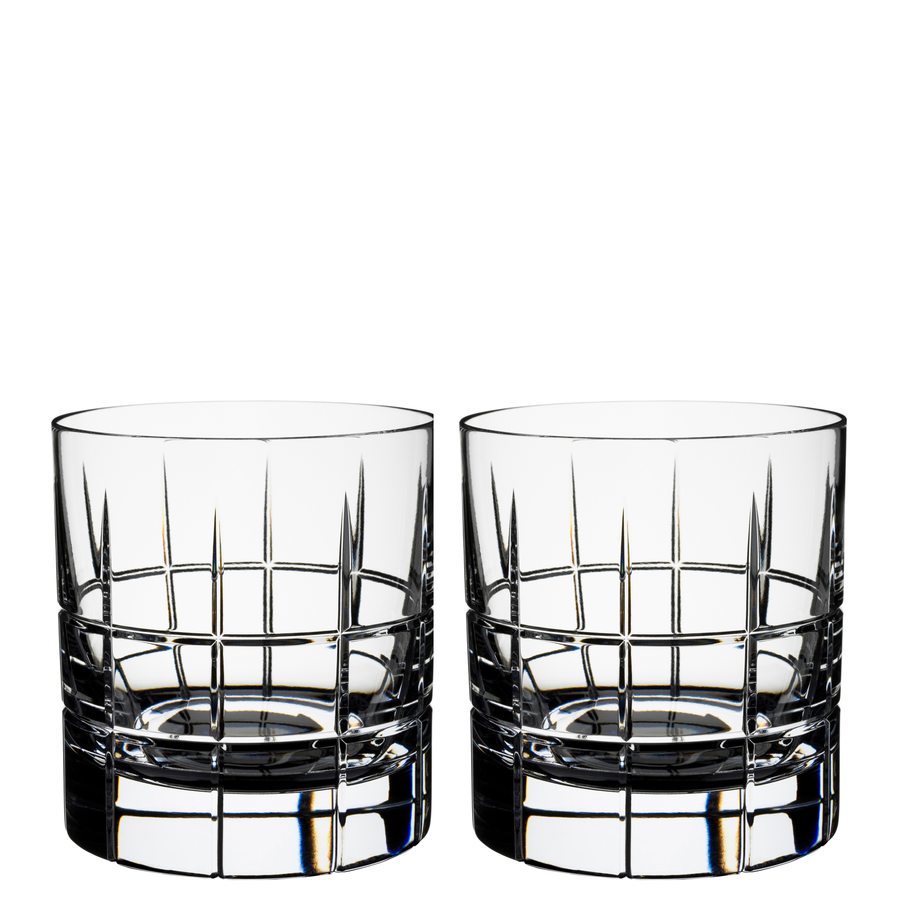 The Orrefors Street Old Fashioned Glass 8oz (2-Pack) features clear crystal tumblers with a geometric grid pattern, embodying timeless elegance and adding a sophisticated touch to any table setting.