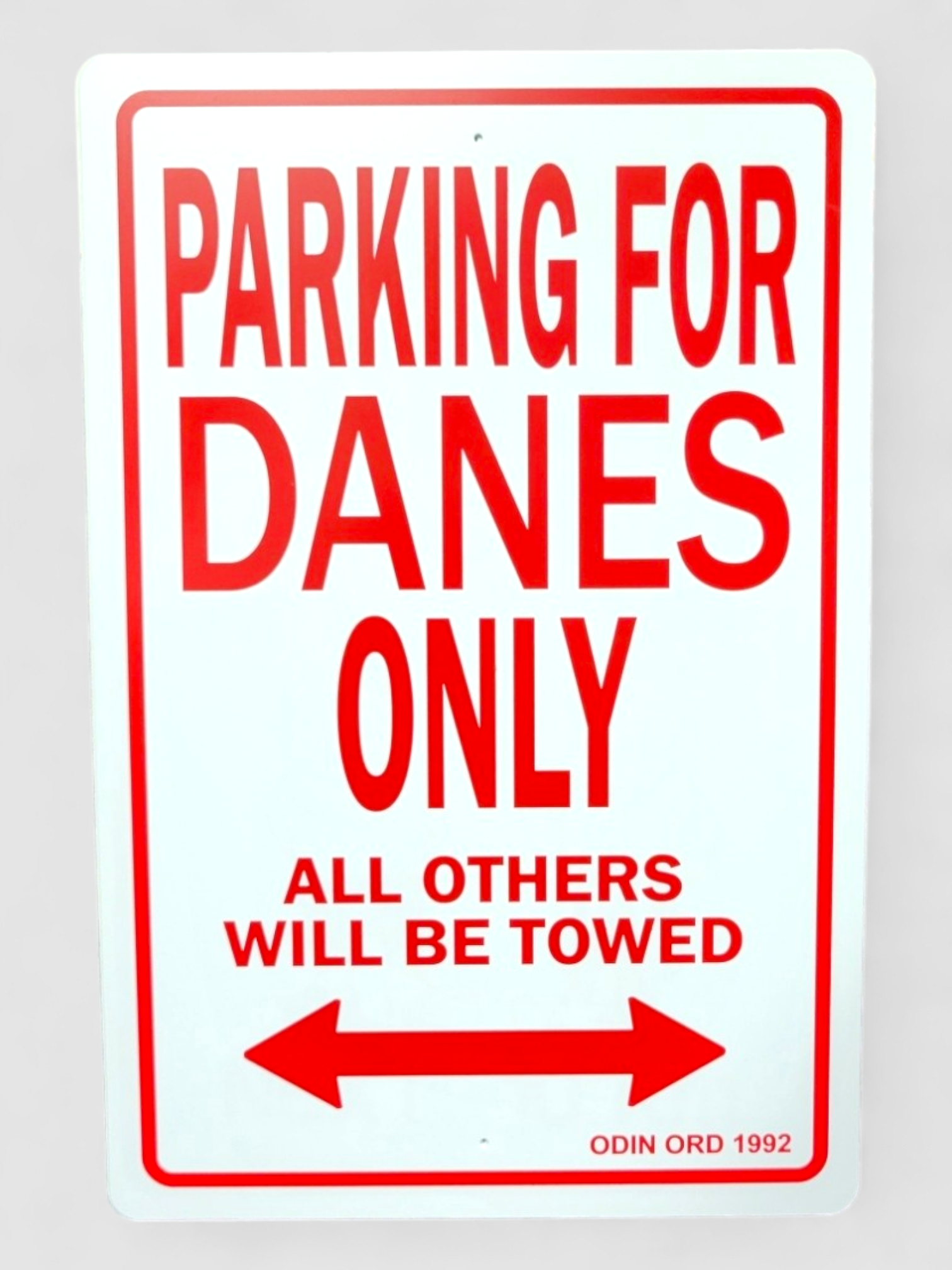 Sign: "Parking for Danes Only"