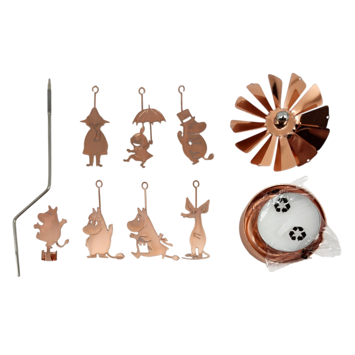 Rose gold Moomin family charms, a metal rod, spinning fan blade, candle holder parts, and two tealight candles arranged on a white background.