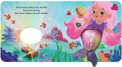 In a vibrant underwater setting, an illustrated mermaid with pink hair admires a starfish and treasures. Fish, coral, and a treasure chest enhance the enchanting world. This magical scene comes to life in the "Book: Teeny Tiny Mermaid (Finger Puppet Book)," ideal for interactive play and promoting language development.