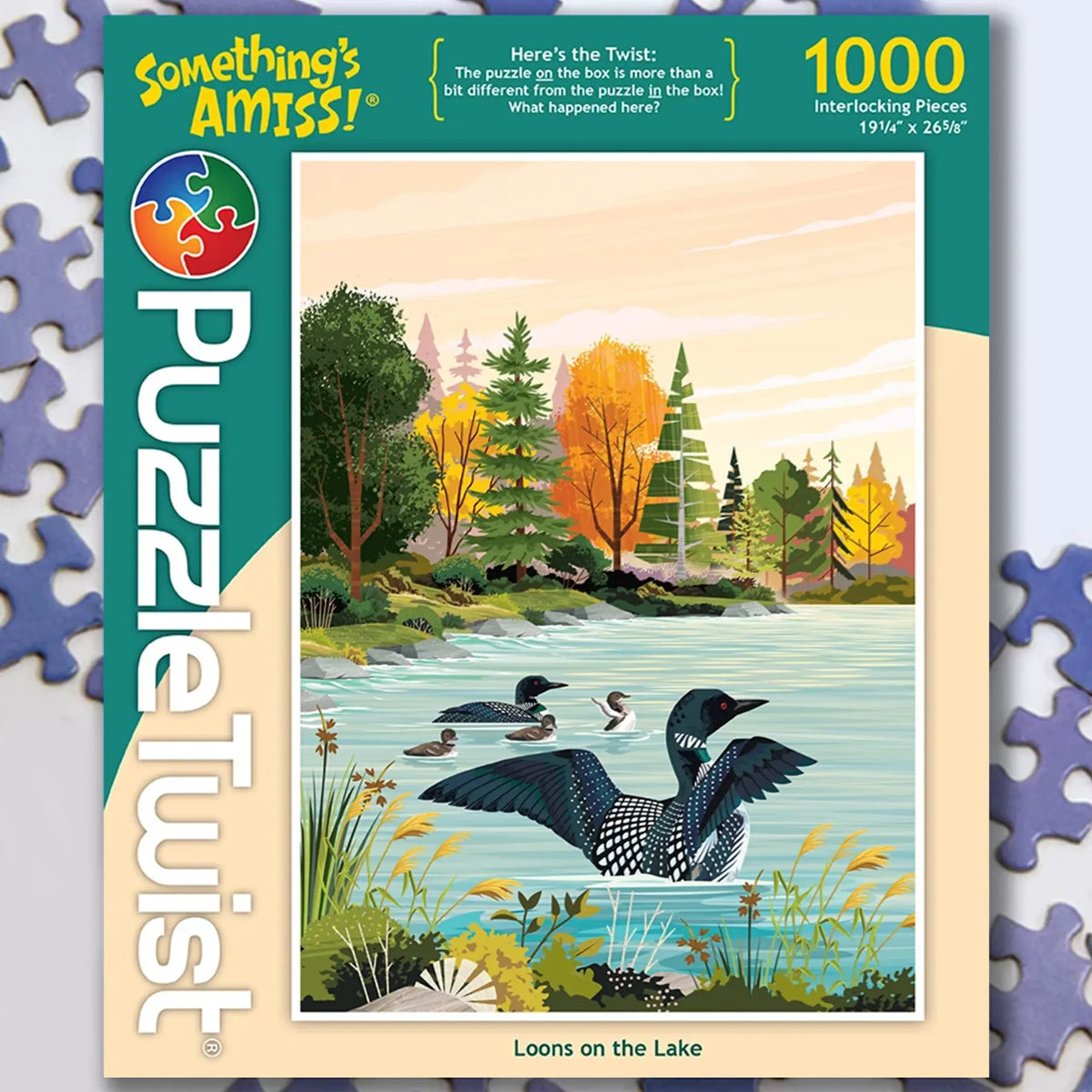 Puzzle box showing Tim Chapman artwork of Minnesota loons on a lake with autumn trees; some puzzle pieces are visible at the box edges.