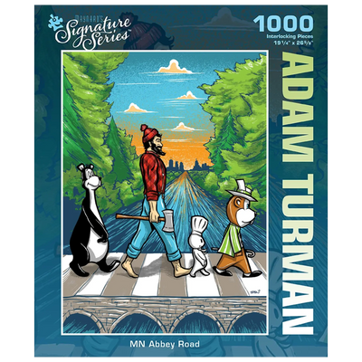 Puzzle box featuring a man and three cartoon animals crossing a road Abbey Road-style, with trees and a sunset in the background. “Adam Turman” visible on the box.