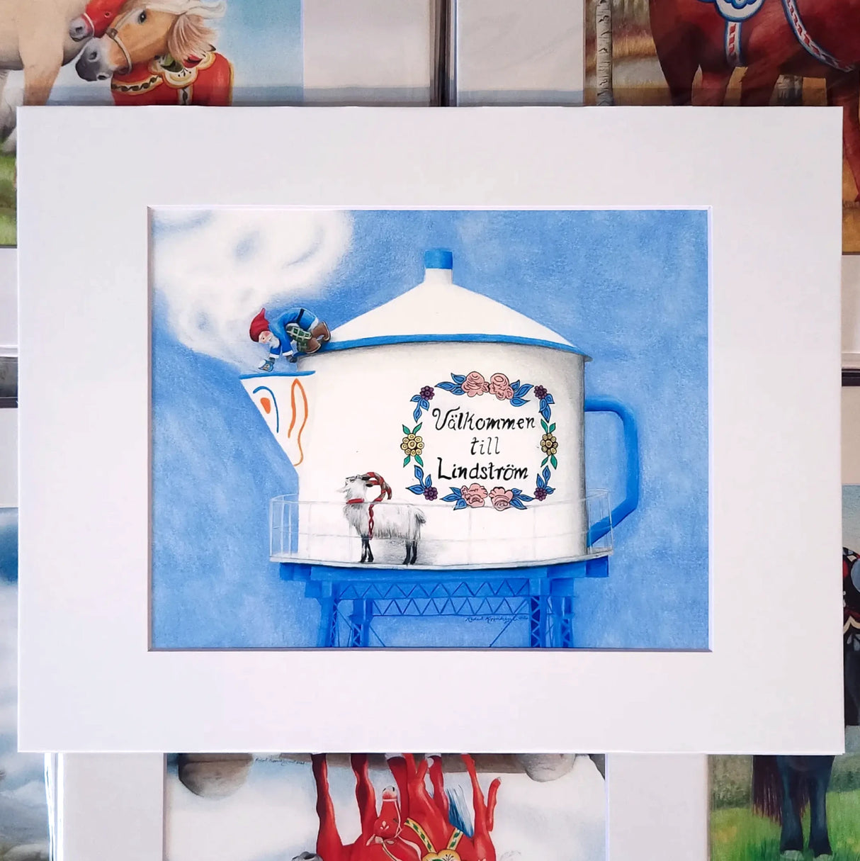 Artwork: Coffee, Anyone? Lindstrom Coffee Pot WaterTower by Rachael Koppendrayer—an 8x10 print matted to 11x14—features the iconic coffee pot atop a blue tower, with folk-art animals and floral accents. Brand: Rachael Koppendrayer.