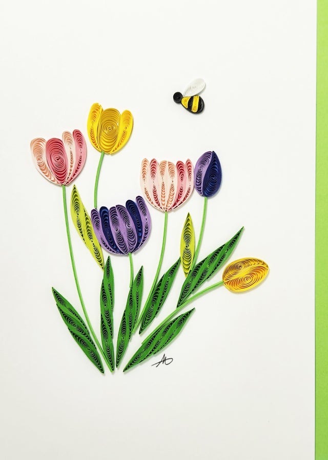 Handmade "Cards: Tulips with Bee Quilling Card 5x7," featuring colorful tulips, green leaves, and a bee on white with a green border. Blank inside with a green envelope—perfect for any occasion or as a unique greeting card.