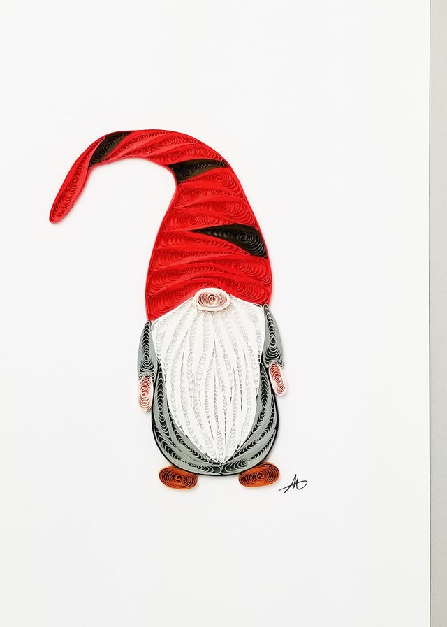 The Cards: Tomte - Gnome with Red Hat Quilling Greeting Card is a 5" × 7" handcrafted 3D paper art card featuring a whimsical tomte gnome—ideal for unique greetings on a plain white background.
