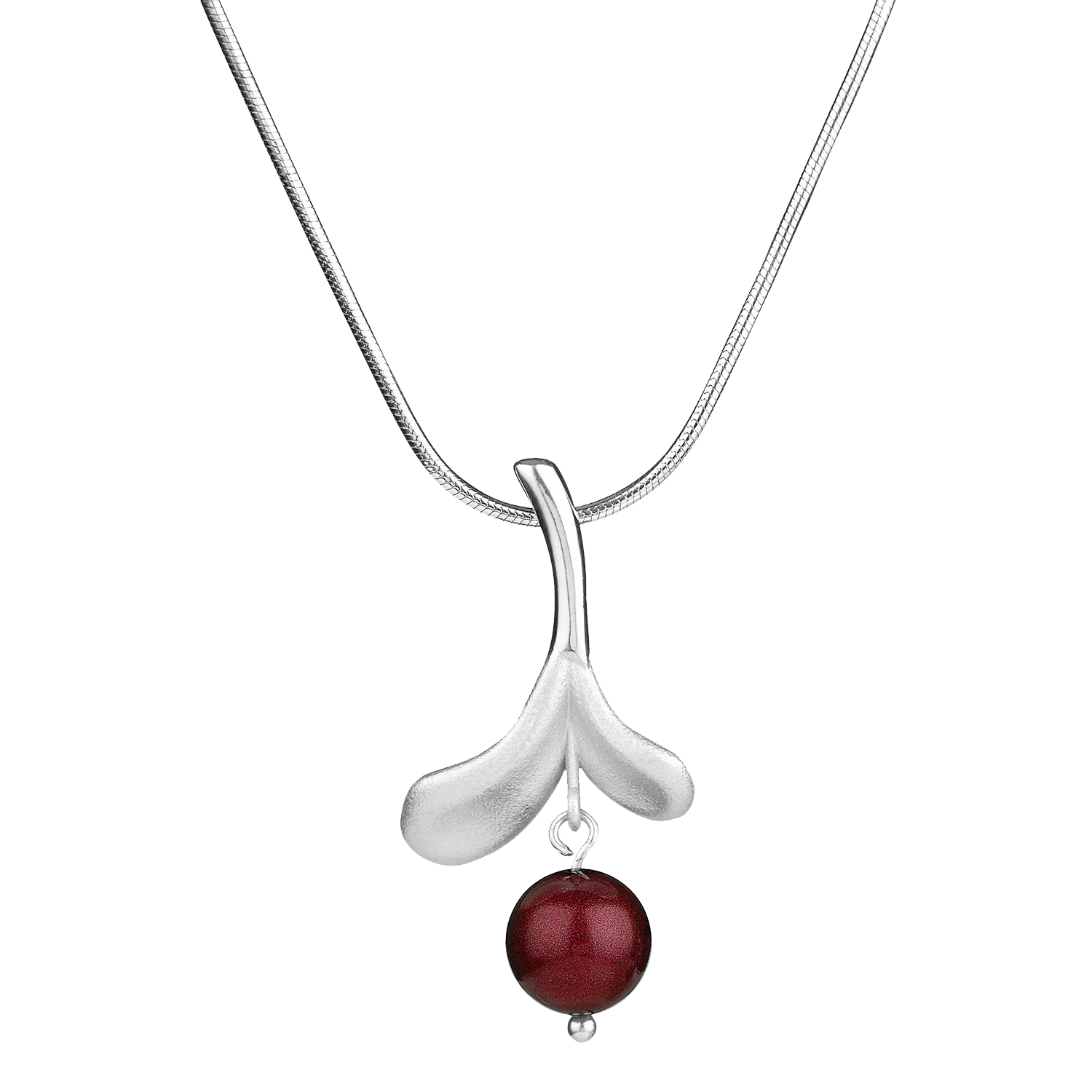 Inspired by Finnish jewelry, the Lingonberry Silver Necklace showcases a smooth curved pendant with a bold red bead set against a white backdrop.