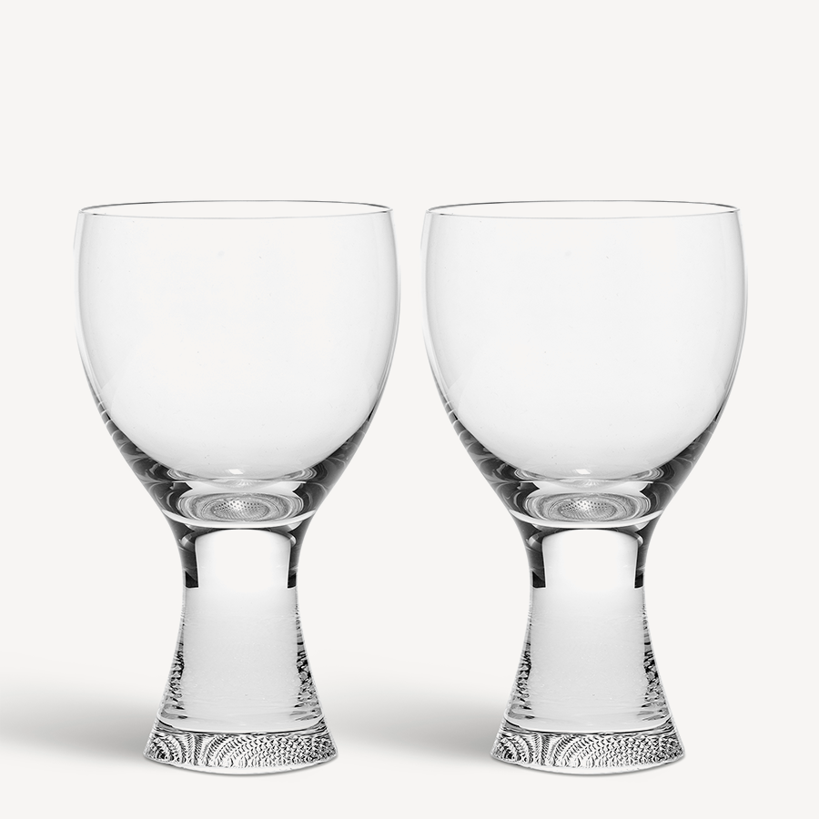 Two clear KostaBoda Limelight Wine XL Glasses (11.8oz, 2-Pack) by Goran Warff, featuring thick textured bases, stand side by side against a white background.