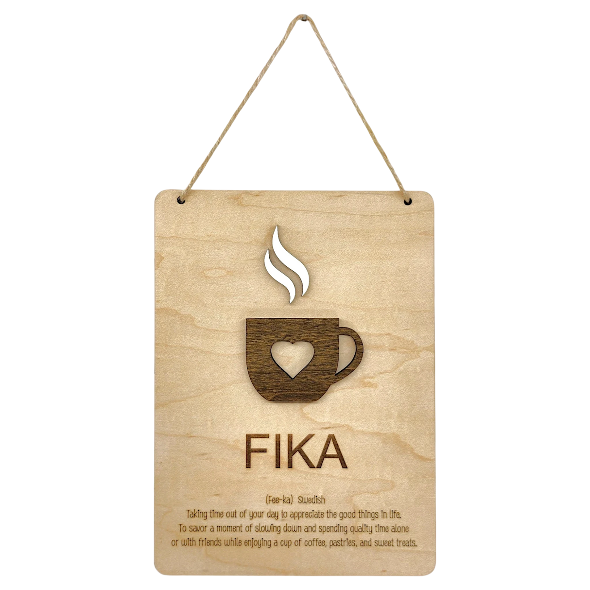 Wooden plaque with a steaming cup cutout, heart detail, and the word “FIKA” in bold letters, referencing the Swedish coffee break tradition.