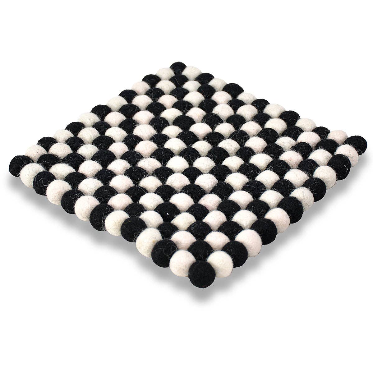 The Square Wool Felted Pom-pom Trivet- Black & White is a handcrafted creation from Nepal, featuring black, white, and gray wool felted pom-pom balls in an elegant grid pattern.