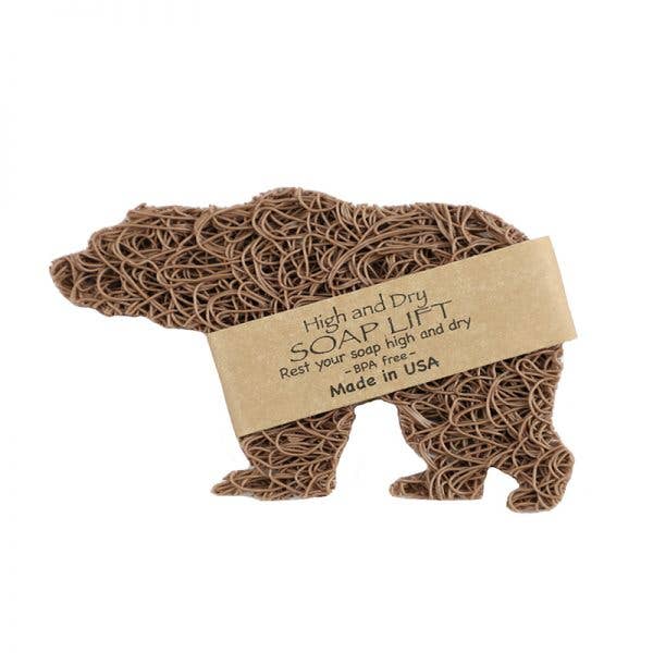 Elevate your soap-keeping experience with the Soap Lift: Soap Saver Bear in Tan. This bear-shaped, eco-friendly bioplastic soap lift keeps your soap high and dry, features a BPA-free construction, and is proudly made in the USA. It’s a perfect addition to any collection of soap dishes.
