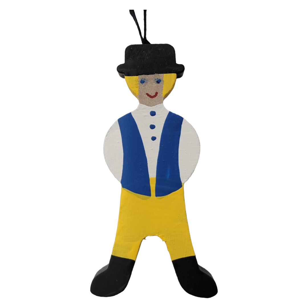 The product "Ornament: National Costume Swedish Boy" features a wooden figure wearing a blue vest and yellow pants, reminiscent of the Swedish flag, along with black shoes and a hat. With its charming smile and convenient string for hanging, it captures the essence of traditional attire.