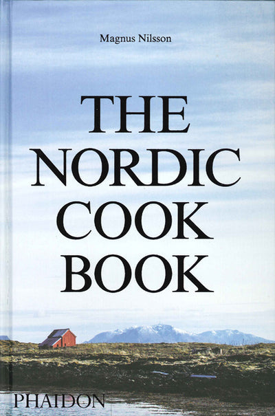 Cover of Nordic Cook Book by Magnus Nilsson, featuring Nordic recipes with a red house against a mountain and sky landscape.