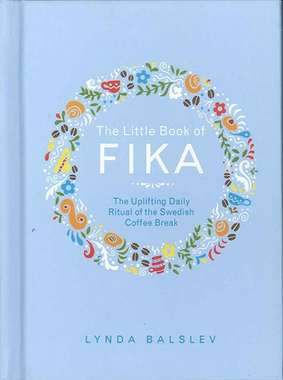 The cover of the Book: Little Book of Fika by Lynda Balslev showcases decorative floral and coffee-themed illustrations set against a light blue background, embodying the spirit of the Swedish coffee break tradition.