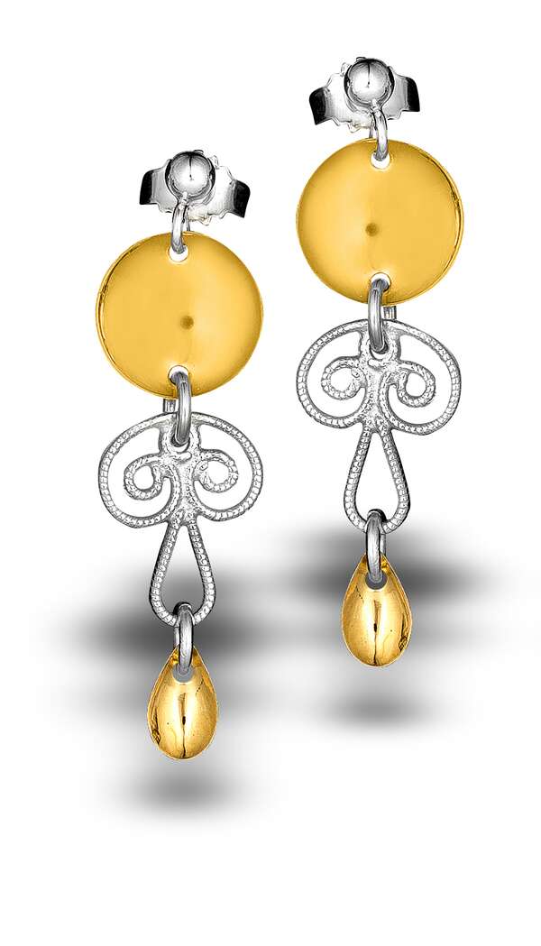 The Earrings: Sølje Earrings feature gold and silver drop design with circular gold tops, detailed sterling silver, and gold teardrop pendants, capturing the elegance inspired by Norwegian culture.