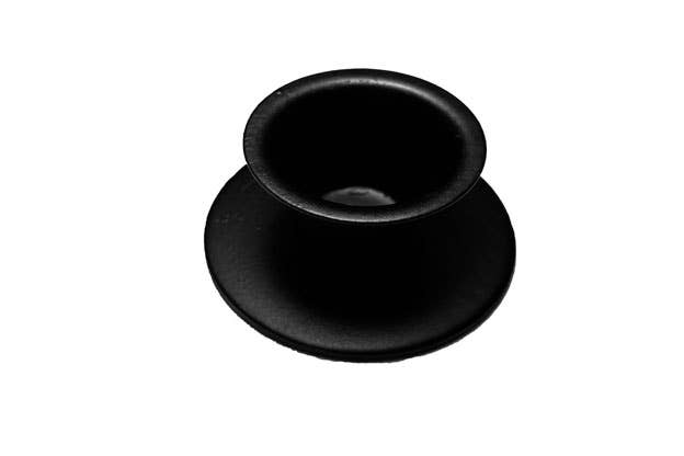 The Candle Holder offers a decorative touch with its sleek black cylindrical design featuring two wide, flat discs, resembling a spool. It is reminiscent of the Round Wrought Iron Taper Candle Holder.