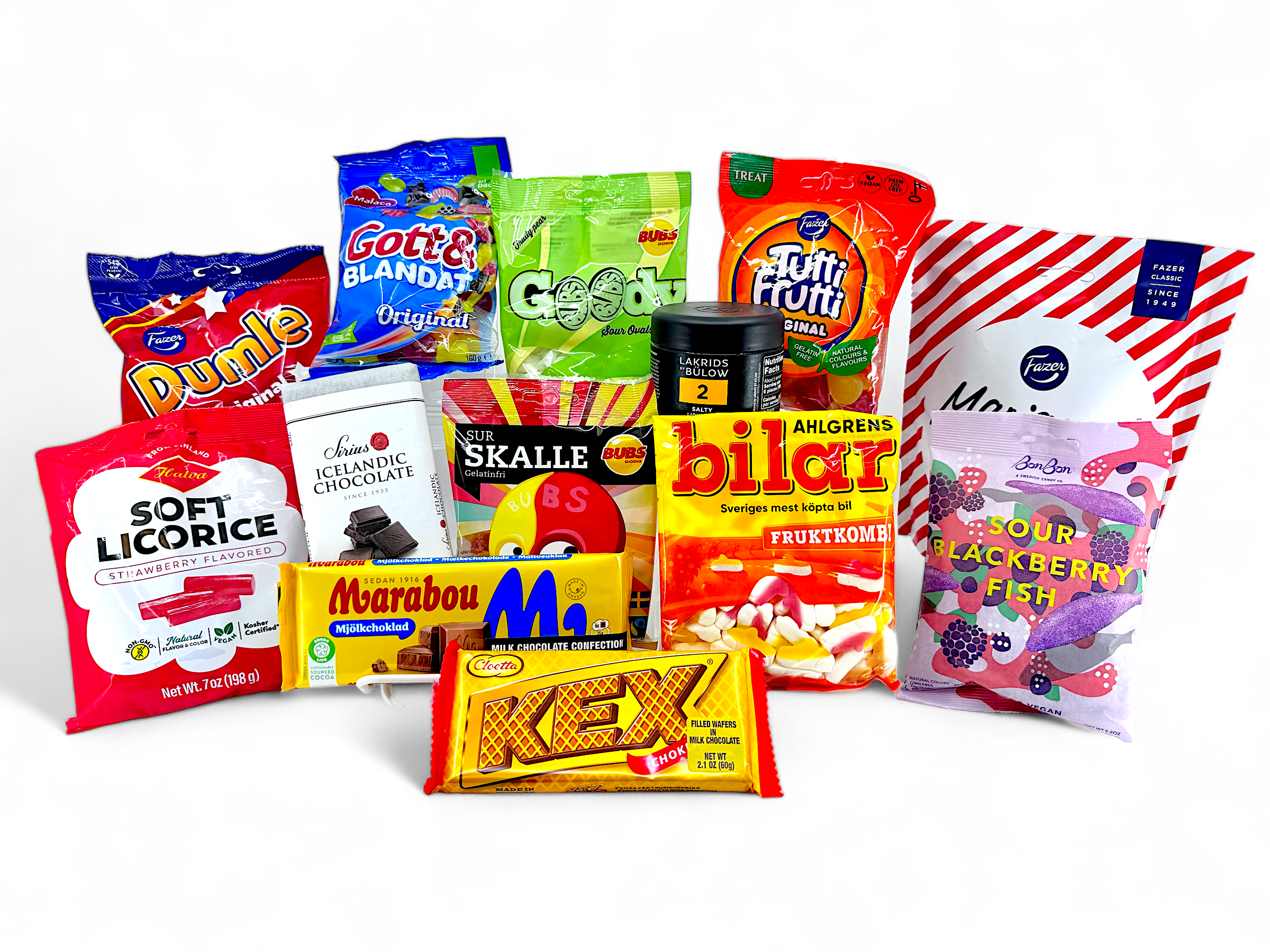 A variety of colorful packaged Swedish candies, including gummies, chocolate, soft licorice, and mixed sweets, are displayed against a plain background.